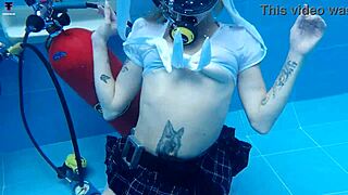 Whoa, Ashlee Rose's skirt soaks up underwater boob tease!