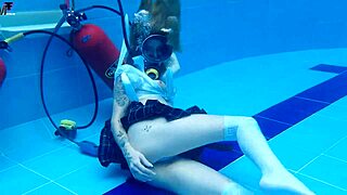 Whoa, Ashlee Rose's skirt soaks up underwater boob tease!