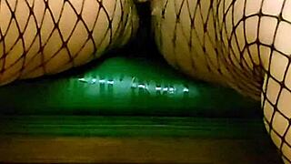 Latina milf Beruka fingers shaved pussy to wet squirting orgasm in fishnets