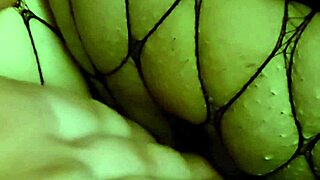 Latina milf Beruka fingers shaved pussy to wet squirting orgasm in fishnets