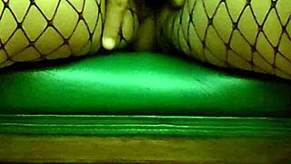 Latina milf Beruka fingers shaved pussy to wet squirting orgasm in fishnets