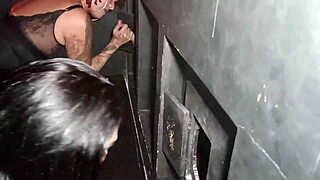 Wife gets excited in gloryhole cabin sucking multiple strangers