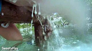 chubby milf pushes out massive anal milk enema in outdoor closeup