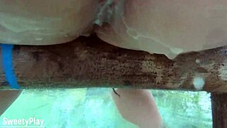 chubby milf pushes out massive anal milk enema in outdoor closeup
