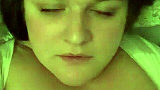 her face twisted in pure moaning ecstasy