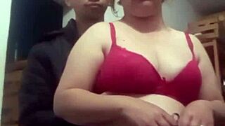 The amateur Latina couple fondles her perky tits live on homemade webcam show