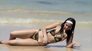 check out her teasing ass on that caribbean beach shore