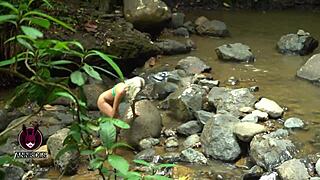 Fucking a stranger under the waterfall as watchers catch us