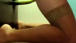 Mysterious shemale in pantyhose rams dildo deep into tight ass solo