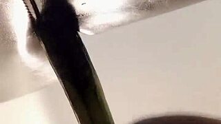 Mysterious shemale in pantyhose rams dildo deep into tight ass solo