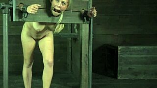 dude, bound bdsm sub gets punished hard in the garage pillory with choking and toys 😩🔗💦