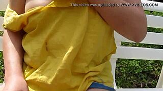 Erika flashes big tits outdoors in public park