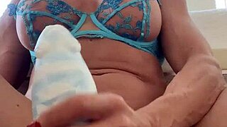 Watch this muscular blonde MILF stretch her huge tits pussy with massive dildo
