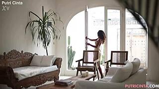Putri cinta unwinds seductively showcasing asian model curves