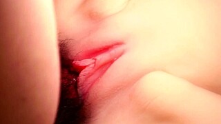 Teasing pink smooth shaved vagina up close
