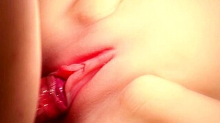 Teasing pink smooth shaved vagina up close