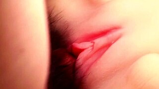 Teasing pink smooth shaved vagina up close