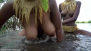 skinny zulu wives bare big tits bathing in village tub