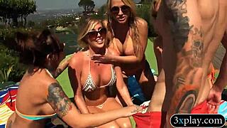 four hot tattooed babes devour hard cock outdoors!