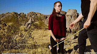 petite sub brooke johnson bound caned facesat rimmed on joshua tree rocks