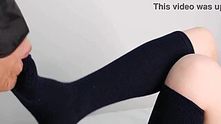 Cute uniform girl in navy socks gives epic footjob to m male
