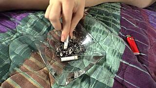 Sadie Kenney Smokes While Finger Fucking Her Shaved Pussy