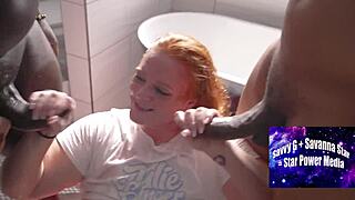Voluptuous redhead gives bathroom blowbang