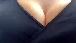 mature woman with big boobs walks outside