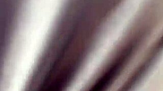 mature woman with big boobs walks outside