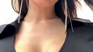 mature woman with big boobs walks outside