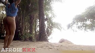 black girl teases on the beach with friends