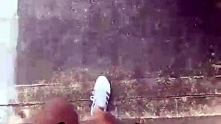 mature woman with big boobs walks outside