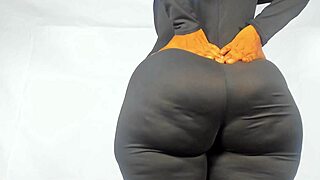 Hourglass shaped big ass mistress in tight jumpsuit