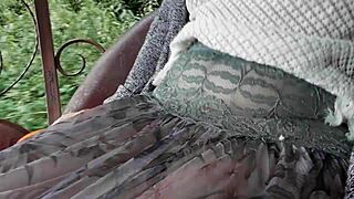 Hairy mature flashes upskirt outdoors