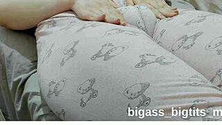 Curvy teen rubs swollen pussy in pajamas