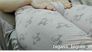 Curvy teen rubs swollen pussy in pajamas