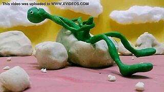 Alien monster jerks huge cock outdoors with toys