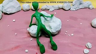 Alien monster jerks huge cock outdoors with toys