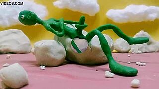 Alien monster jerks huge cock outdoors with toys