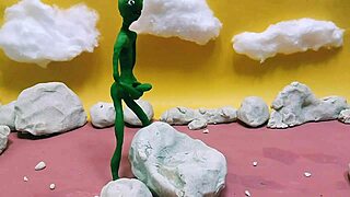 Alien monster jerks huge cock outdoors with toys