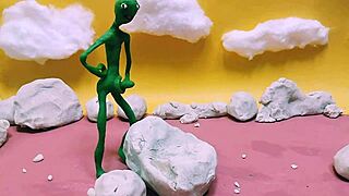 Alien monster jerks huge cock outdoors with toys