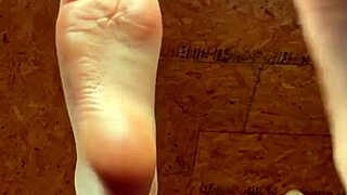 Girl Applies Lotion On Her Feet
