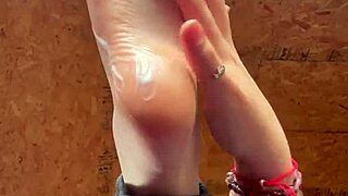Girl Applies Lotion On Her Feet