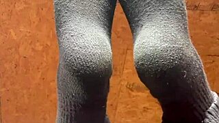 Girl Applies Lotion On Her Feet