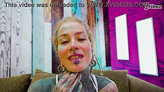 Tattooed queen in white lingerie masturbates with toys