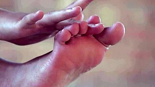 Latina receives foot cumshot in scene
