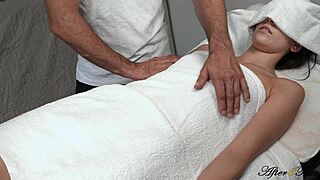 masseur gives client relaxing body treatment