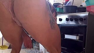  Woman in kitchen wearing panties