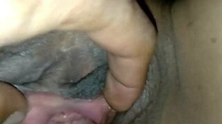 spreading her wet pussy for a hard cock