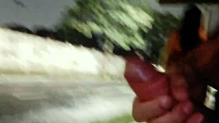 Risky handjob for hot babe at the bus stop!